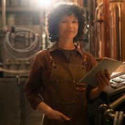 medium-shot-woman-working-beer-factory_23-2150573908